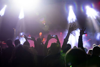 Group of people at music concert