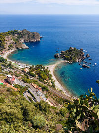 High angle view of sea against blue sky