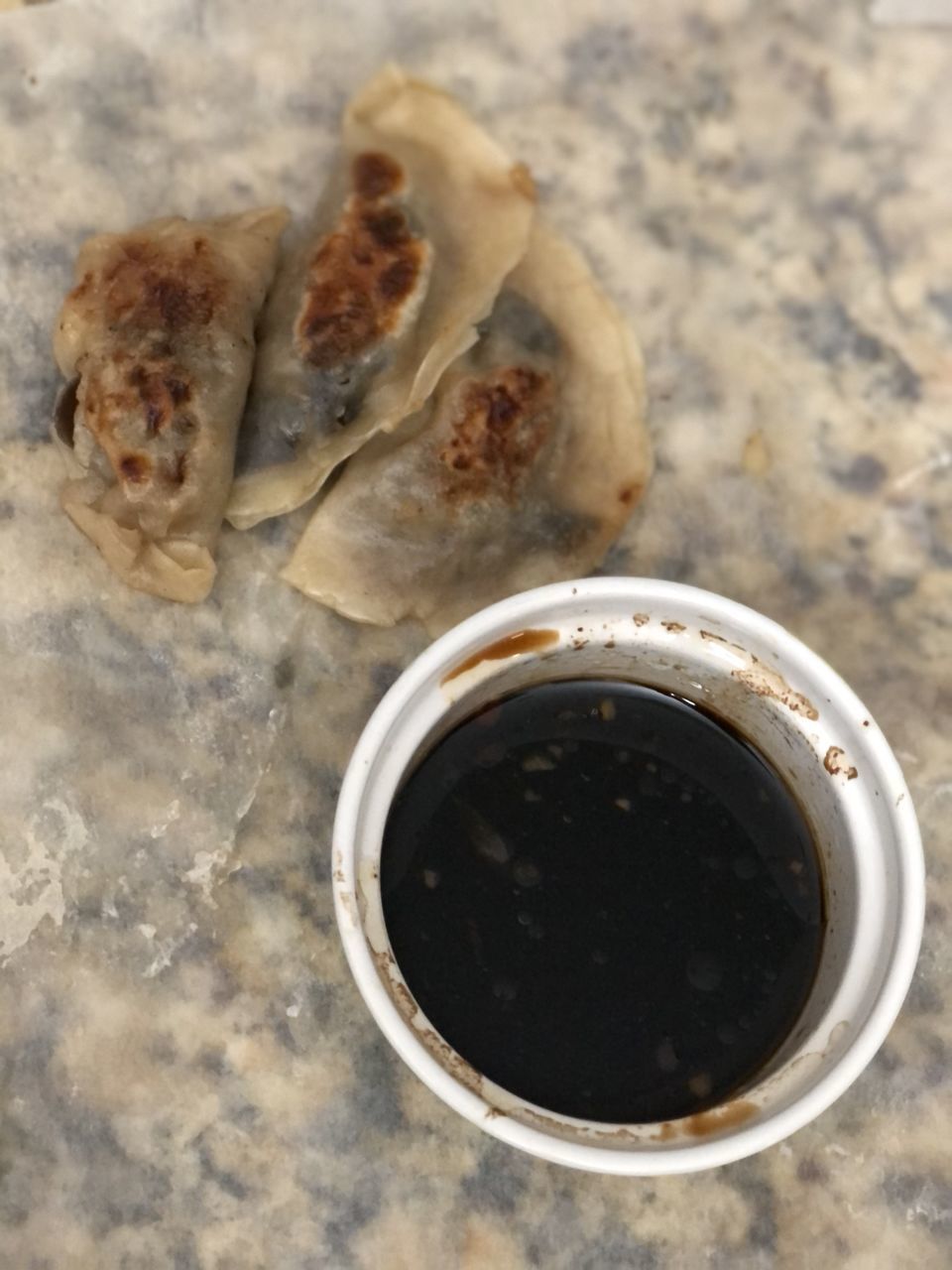 HIGH ANGLE VIEW OF BREAD IN CUP ON TABLE