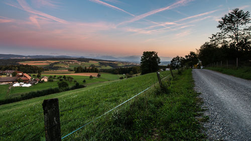 Scenic view of landscape against sky during sunset