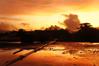 Scenic view of silhouette land against sky during sunset