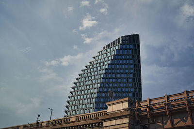 Low angle view of modern building against sky