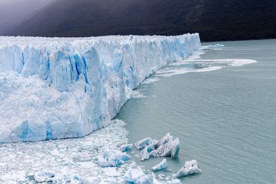 Scenic view of glacier in sea