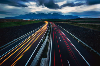 High angle view of light trails on highway