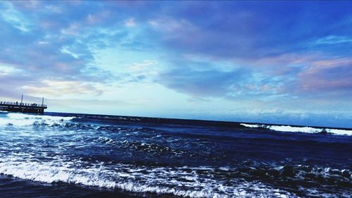 View of sea against cloudy sky