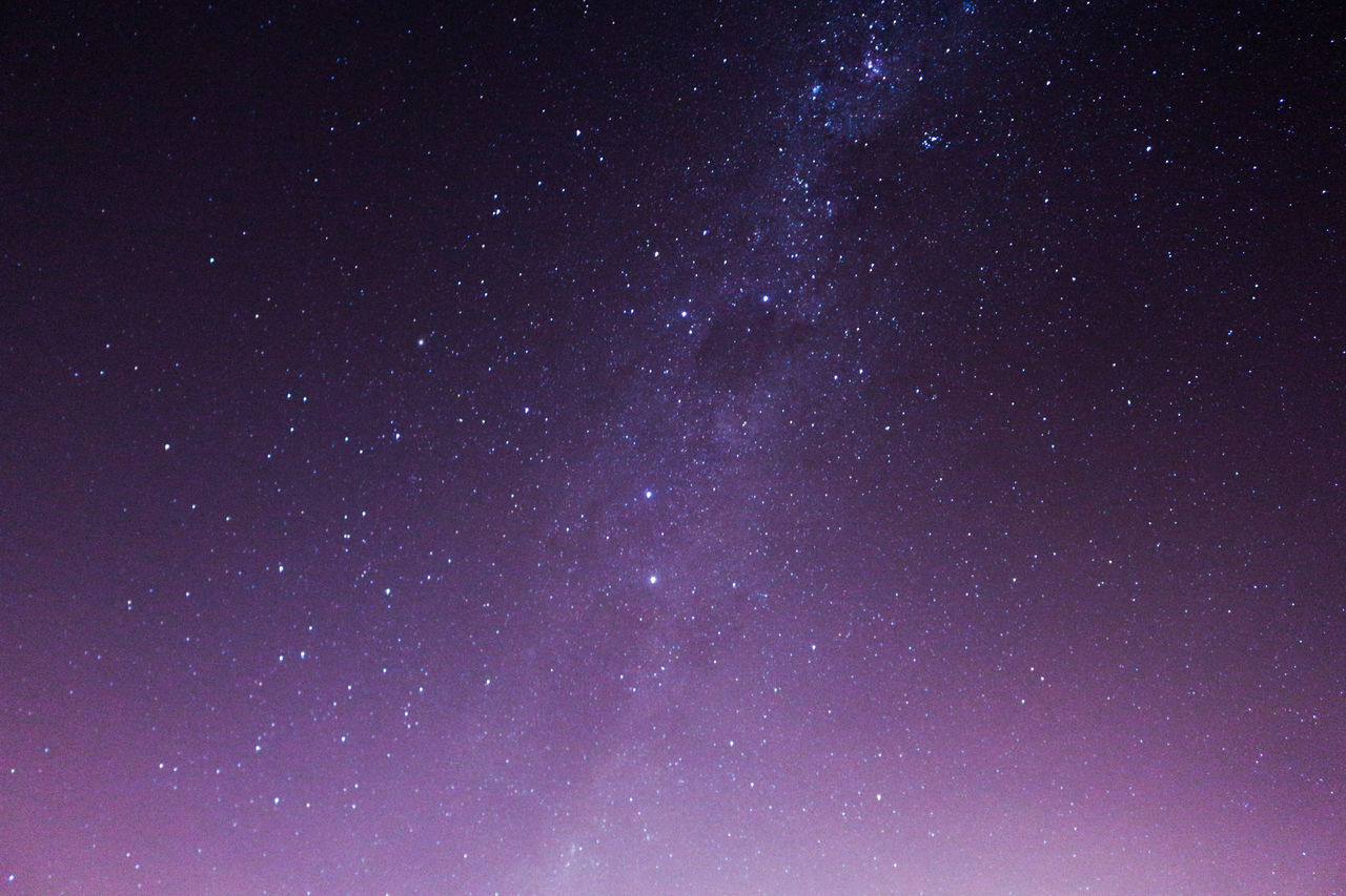 LOW ANGLE VIEW OF STARS AGAINST STAR FIELD