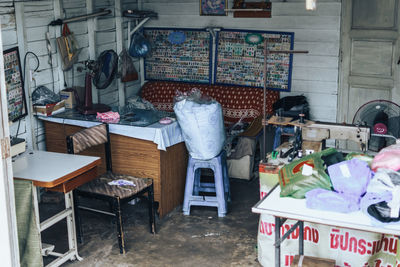 Chairs and tables at market stall