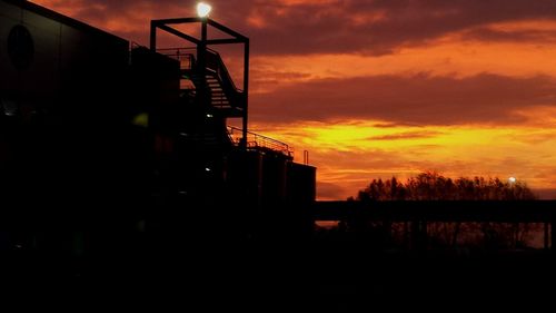 Built structure against sunset sky