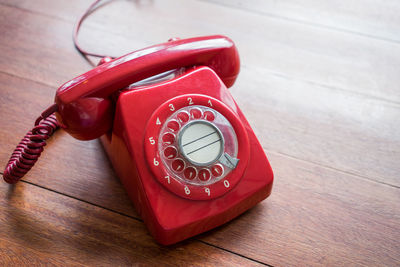 High angle view of telephone on table