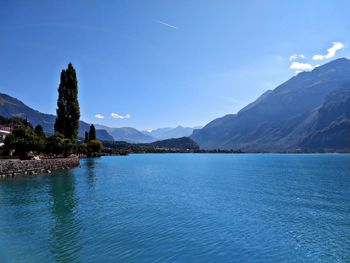 Scenic view of lake against blue sky