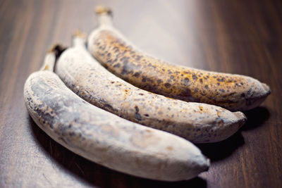 Close-up of frozen bananas on table
