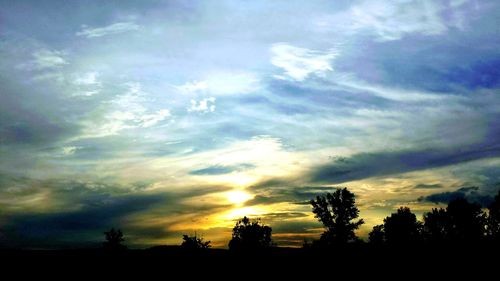 Scenic view of silhouette landscape against sky during sunset