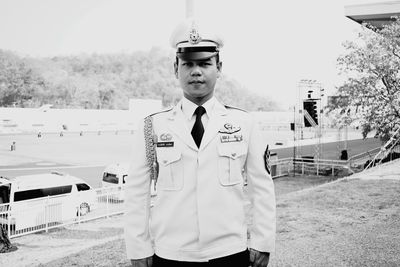 Portrait of young man standing outdoors