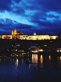 Illuminated buildings at waterfront