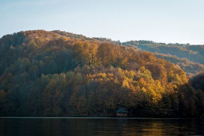 Scenic view of lake against sky during autumn