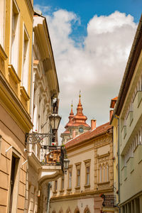 Low angle view of buildings against sky in city