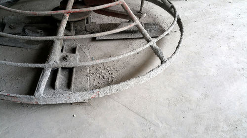 High angle view of rope tied up on wall