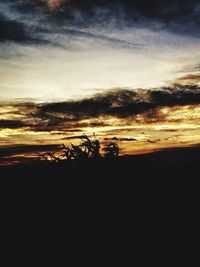 Scenic view of dramatic sky during sunset