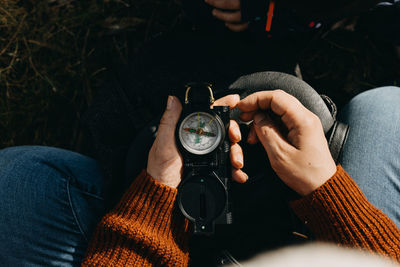 Woman holding compass