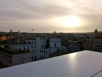 High angle view of townscape against sky during sunset