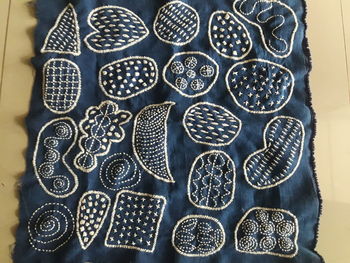 High angle view of blue metal on table
