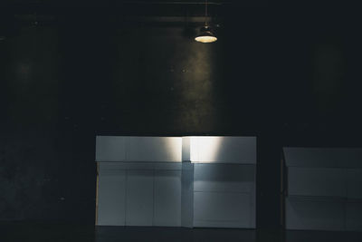 Illuminated lights on wall