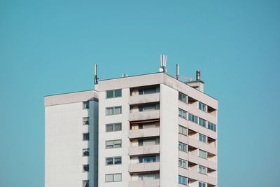 Low angle view of building against blue sky