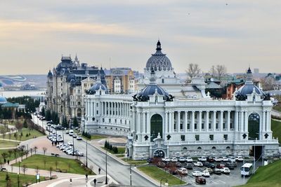 Panoramic view of buildings in city against sky