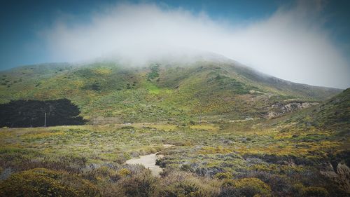 Scenic view of mountains against sky