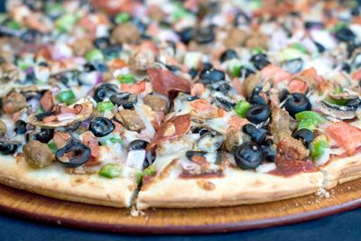 Close-up of pizza in plate on table