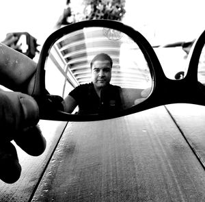 Portrait of young man in car