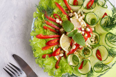 High angle view of chopped fruits in plate