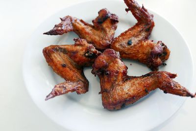 Close-up of chicken wings served in plate