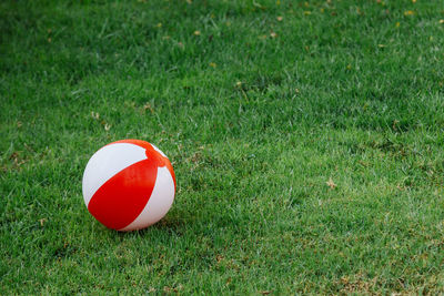 High angle view of red ball on field