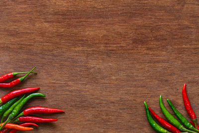 Directly above shot of red chili peppers on table