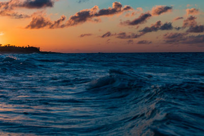 Scenic view of sea against sky during sunset