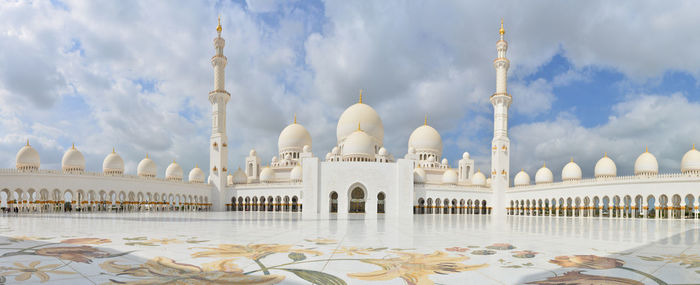 Panoramic view of mosque against sky in city
