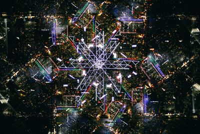 Illuminated christmas tree at night