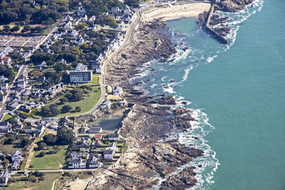 High angle view of river by built structures