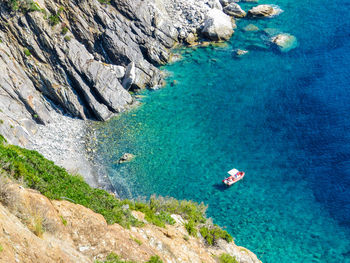 High angle view of rock formation in sea