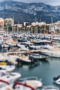 Boats moored at harbor