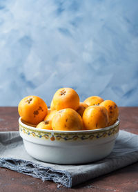 Close-up of fruits in bowl on table