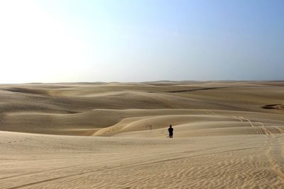 Scenic view of desert against clear sky