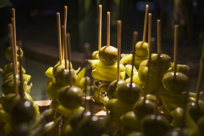 Close-up of figurine in container on table