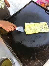 High angle view of person preparing food