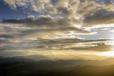 Scenic view of mountains against sky during sunset