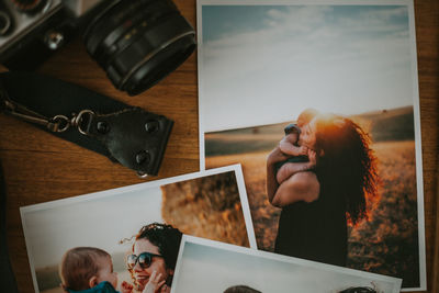 Directly above view of photographs on table