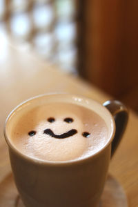 Close-up of coffee cup on table