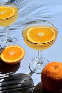 Close-up of orange juice in glass on table