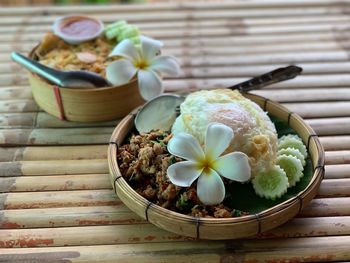 Close-up of flowers in bowl on table